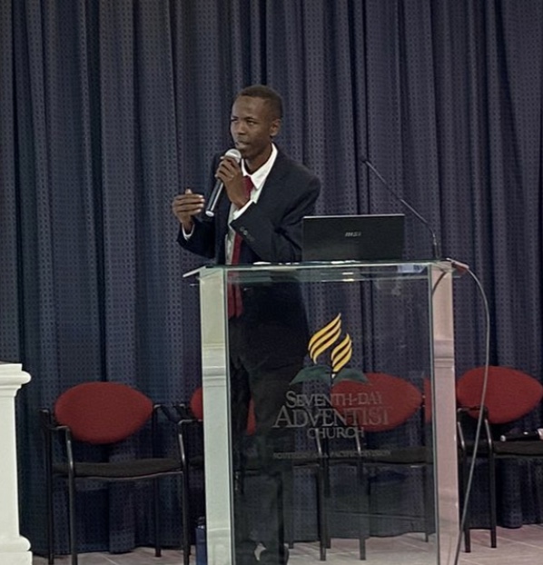 James preaching during a ministry engagement