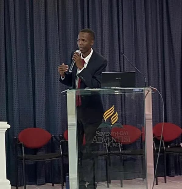 James preaching during a ministry engagement